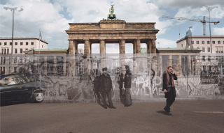 Illustration for article titled Haunting photographs show historical events erupting into the present day